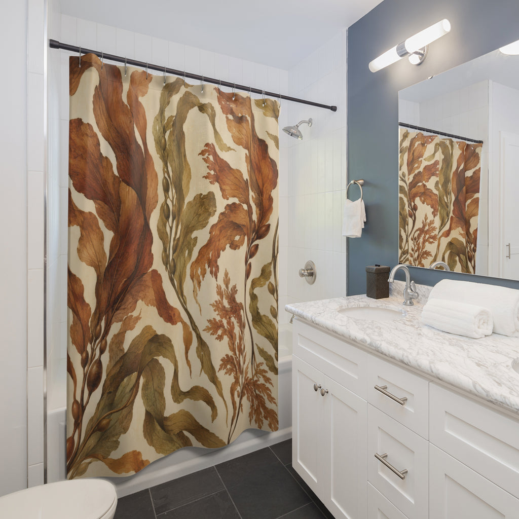 Copper-brown and olive kelp on sandy cream shower curtain beside a white vanity