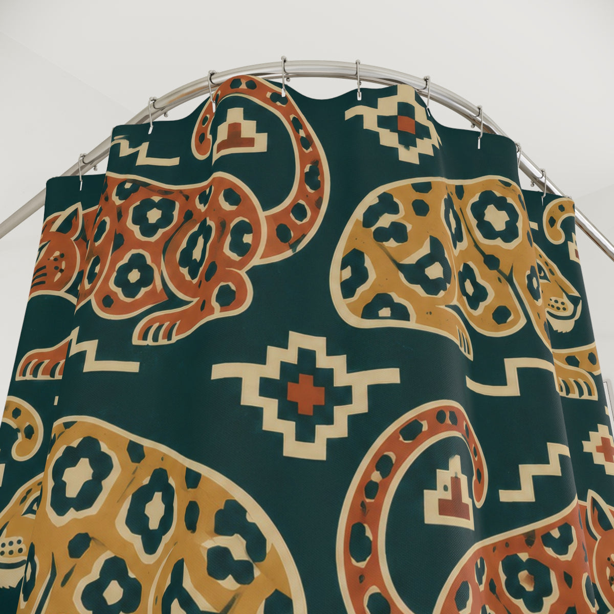 Terracotta and ochre jaguars on teal shower curtain with close-up print, hooks, and folds