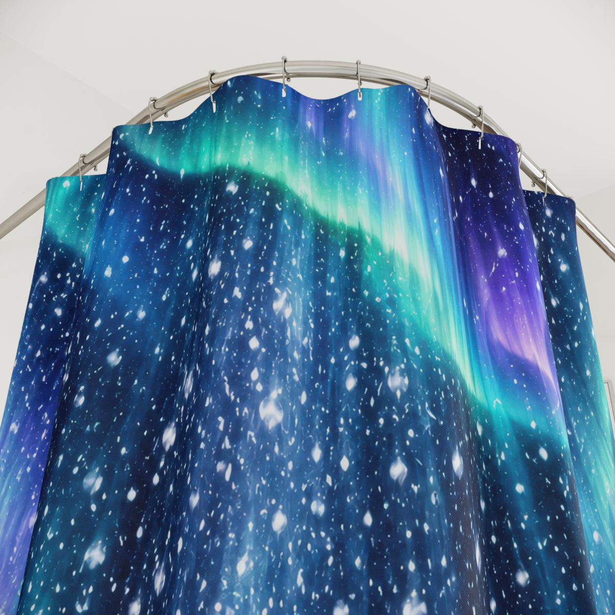 Aurora night snowfall shower curtain with close-up print, hooks, and folds