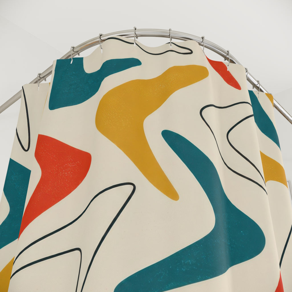 Teal, mustard and red boomerangs on ivory shower curtain with close-up print, hooks, and folds