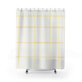 Pale lemon windowpane check on warm white shower curtain with full front view