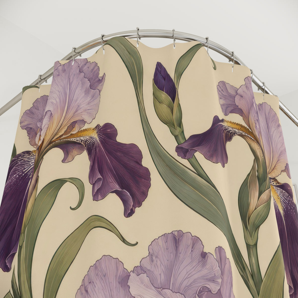 Lavender and plum irises with curling sage leaves on cream shower curtain with close-up print, hooks, and folds