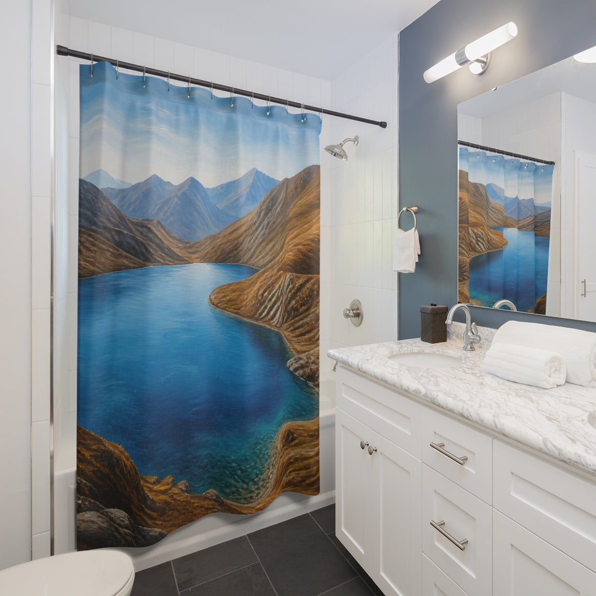 Blue alpine lake between warm brown mountain slopes shower curtain beside a white vanity