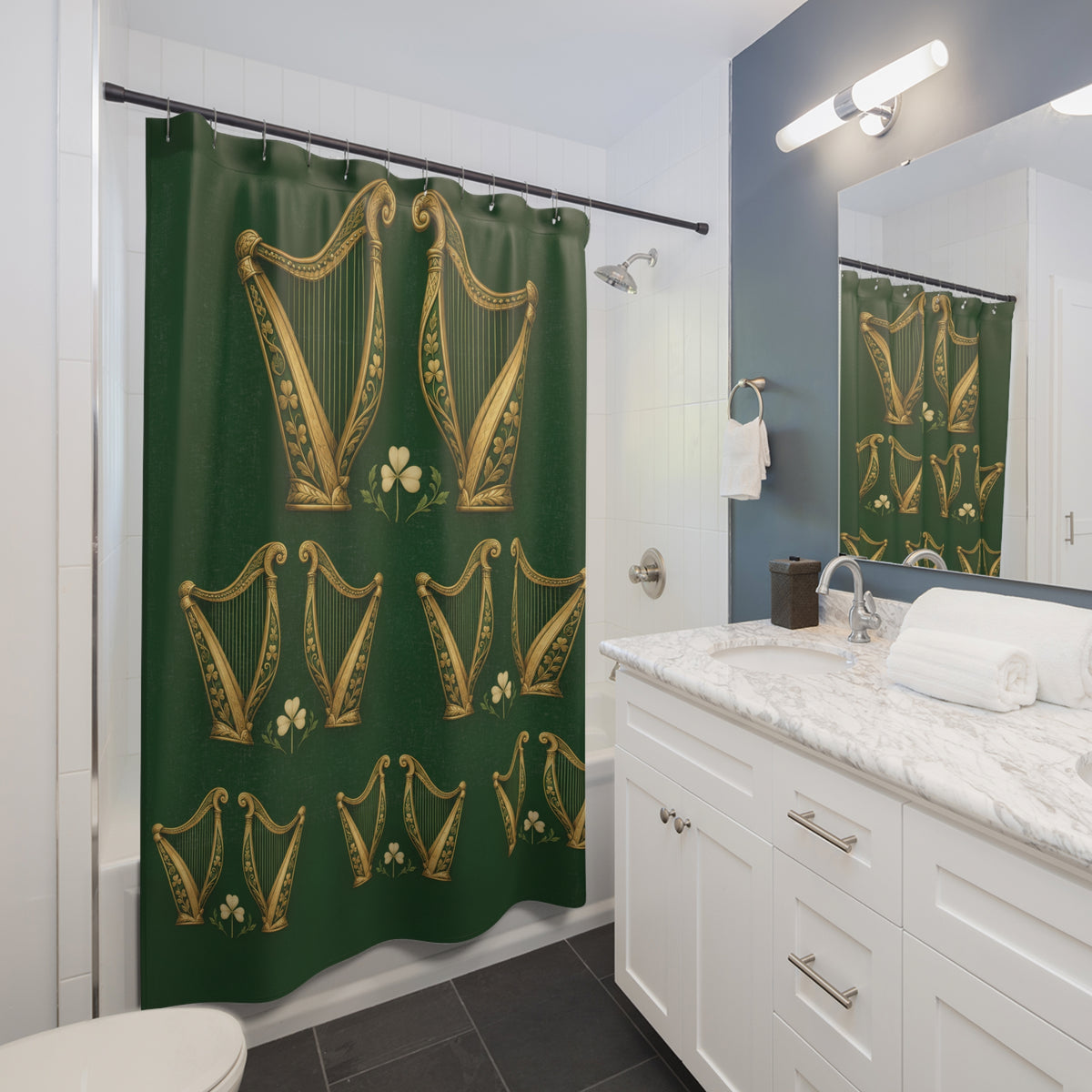 Gold-tone Irish harps and cream shamrocks on green shower curtain beside a white vanity