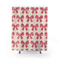 Pink bow pattern with raspberry loops on warm cream shower curtain with full front view