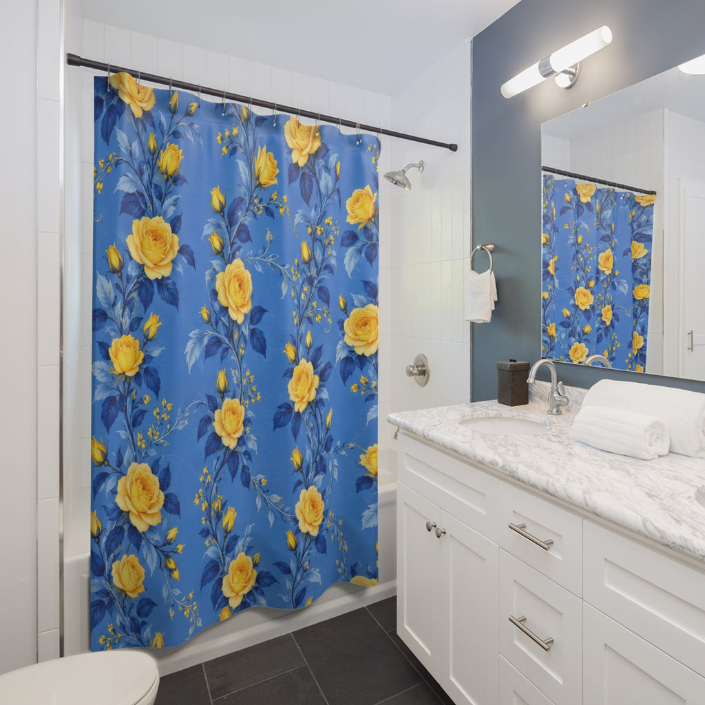 Yellow rose garlands with blue leaves on cornflower blue shower curtain beside a white vanity