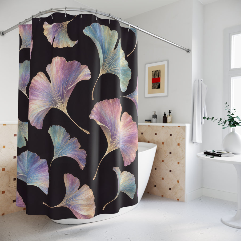 Pastel iridescent ginkgo leaves on a plum-black ground shower curtain beside a freestanding tub