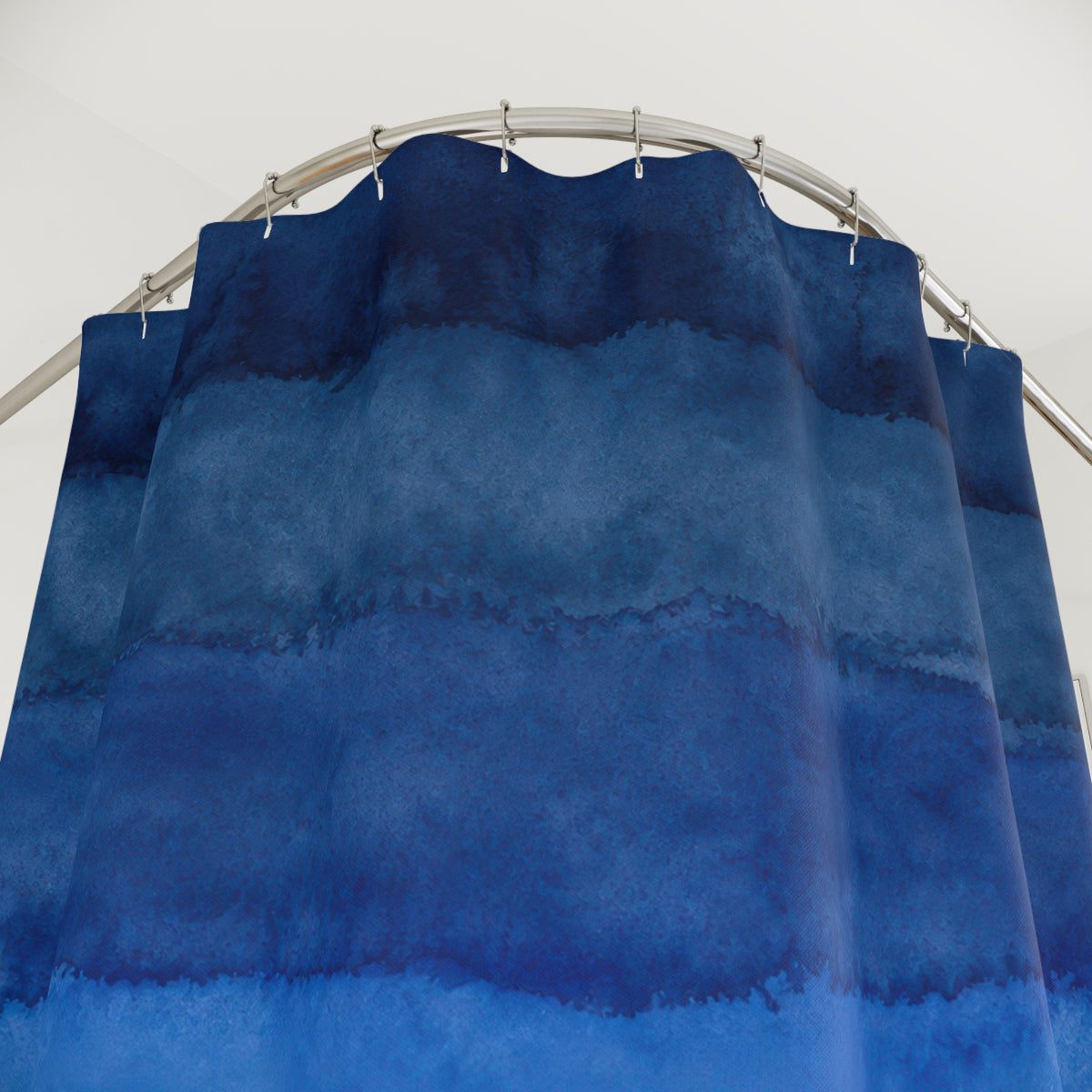 Navy Cobalt Horizontal Watercolor Bands shower curtain with close-up print, hooks, and folds