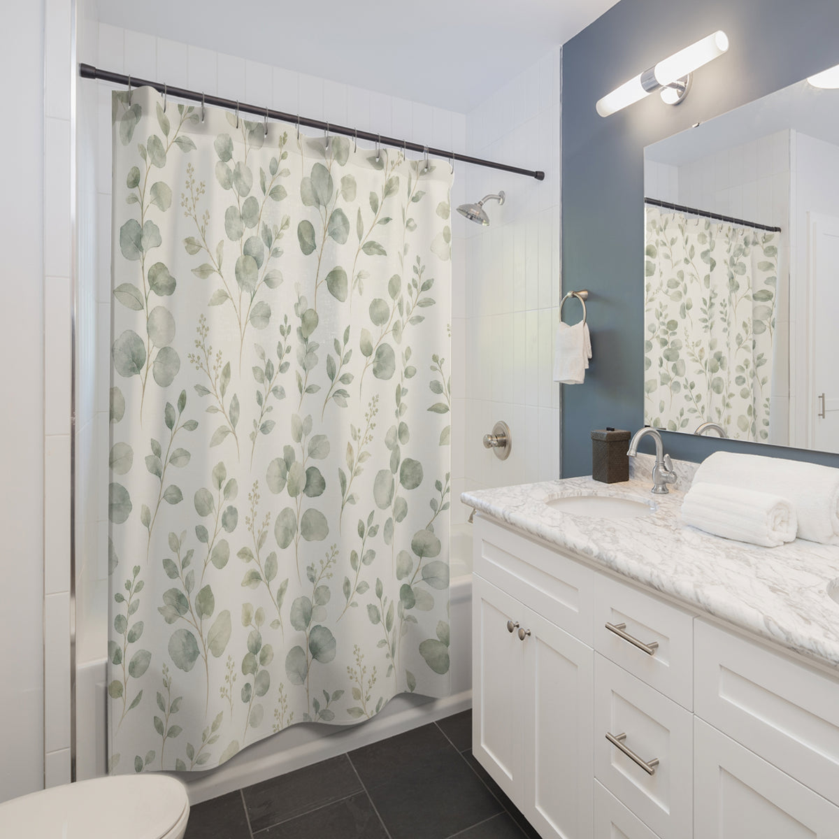 Sage Green Botanical eucalyptus soft shower curtain beside a white vanity