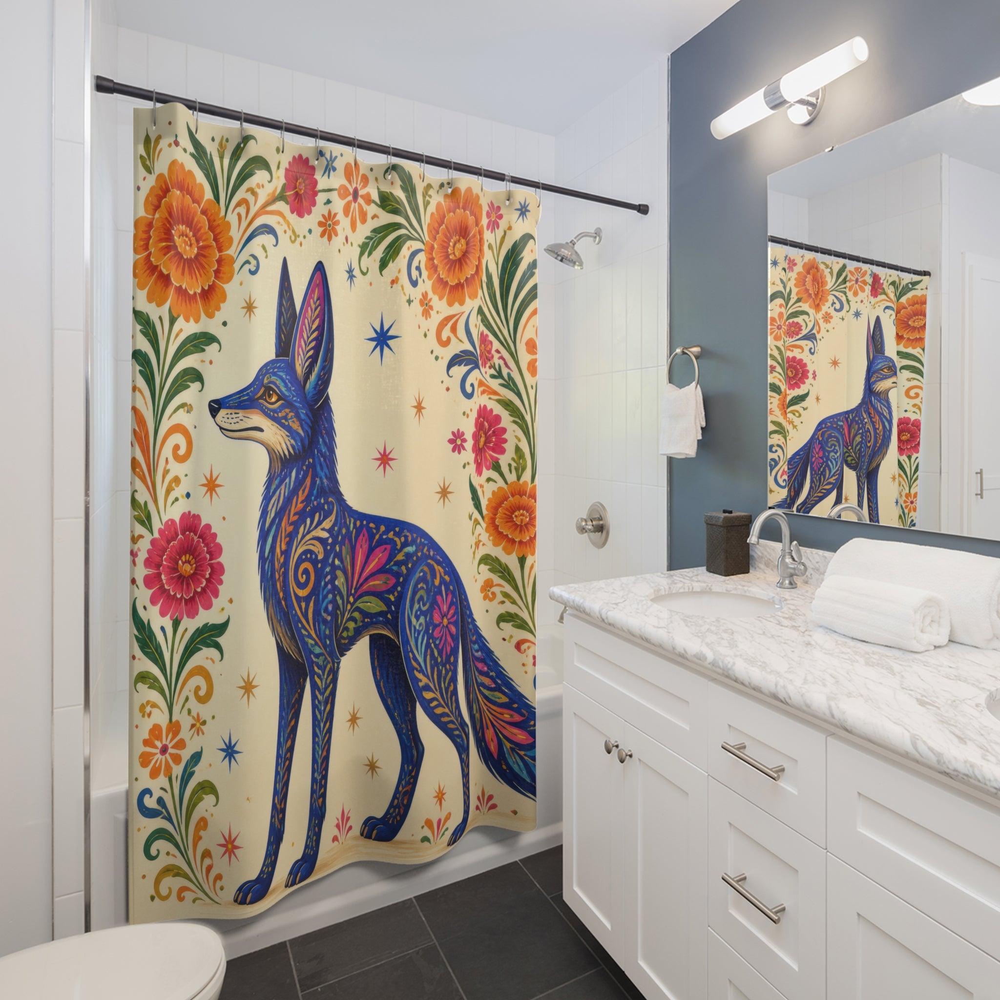 Cobalt alebrije coyote beneath a floral arch shower curtain beside a white vanity