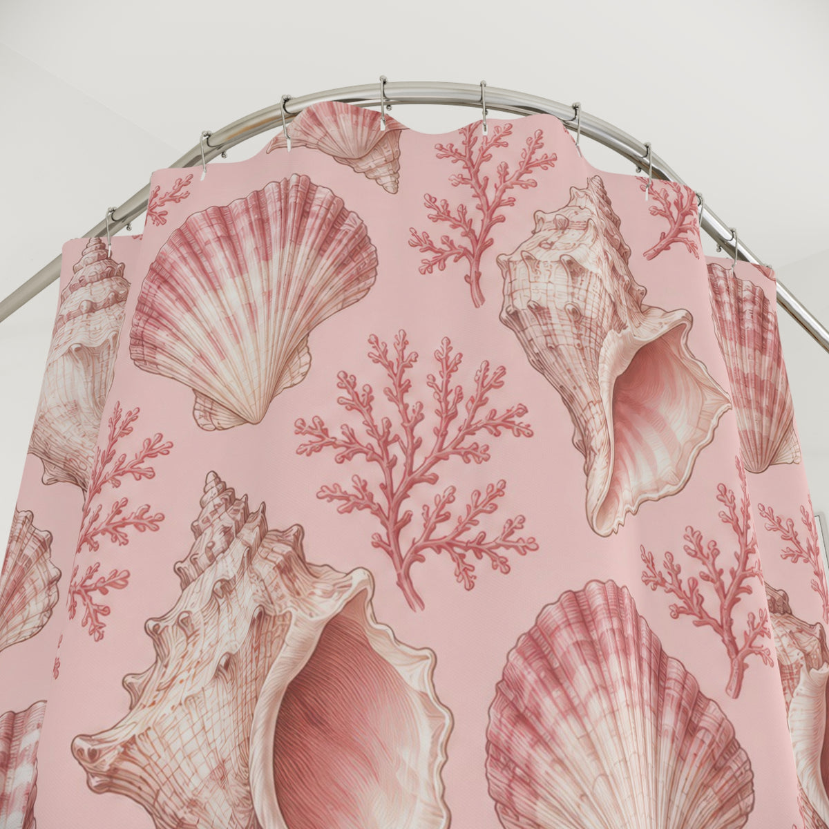 Light pink and ivory seashells with rose coral shower curtain with close-up print, hooks, and folds