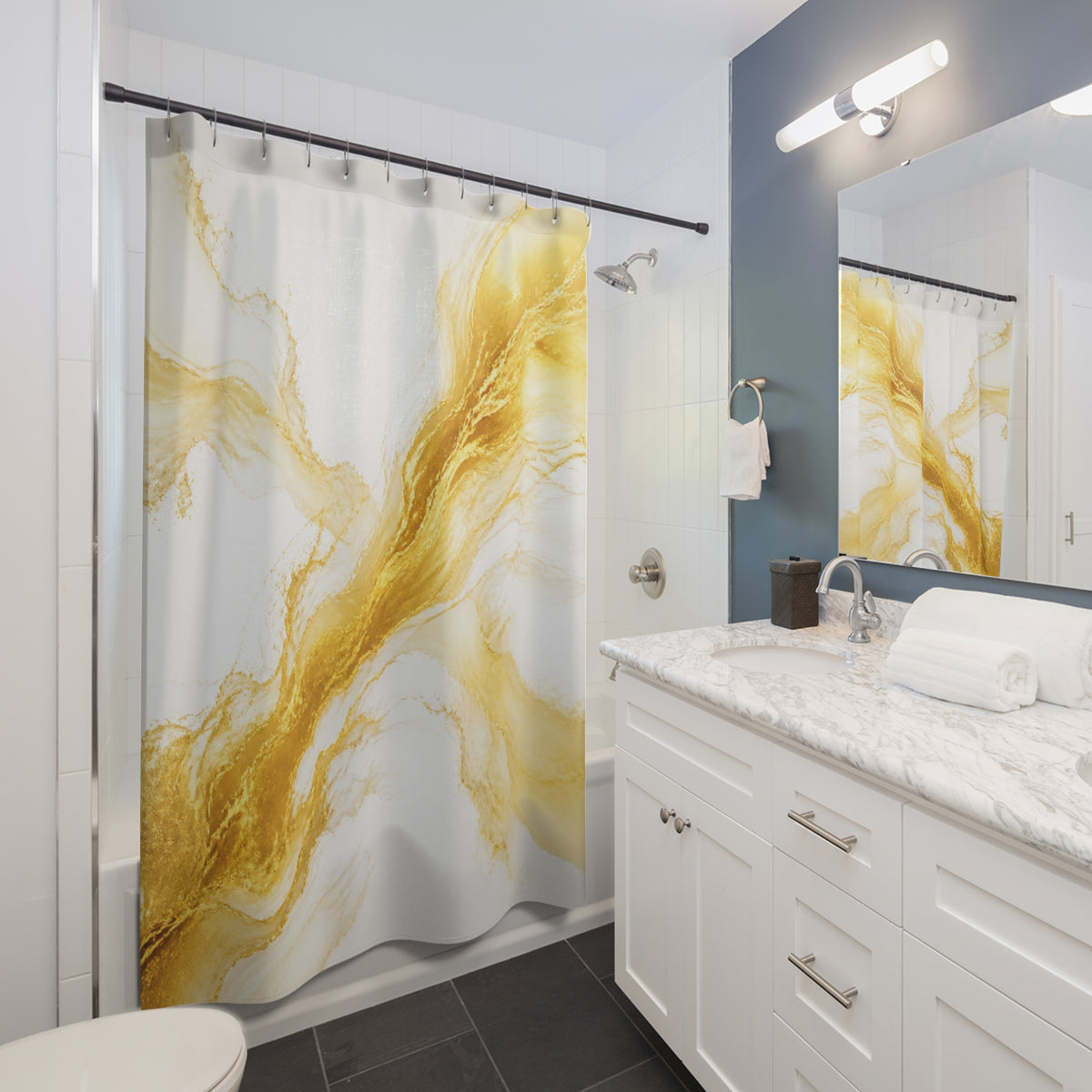 Flowing gold abstract brush forms on white shower curtain beside a white vanity