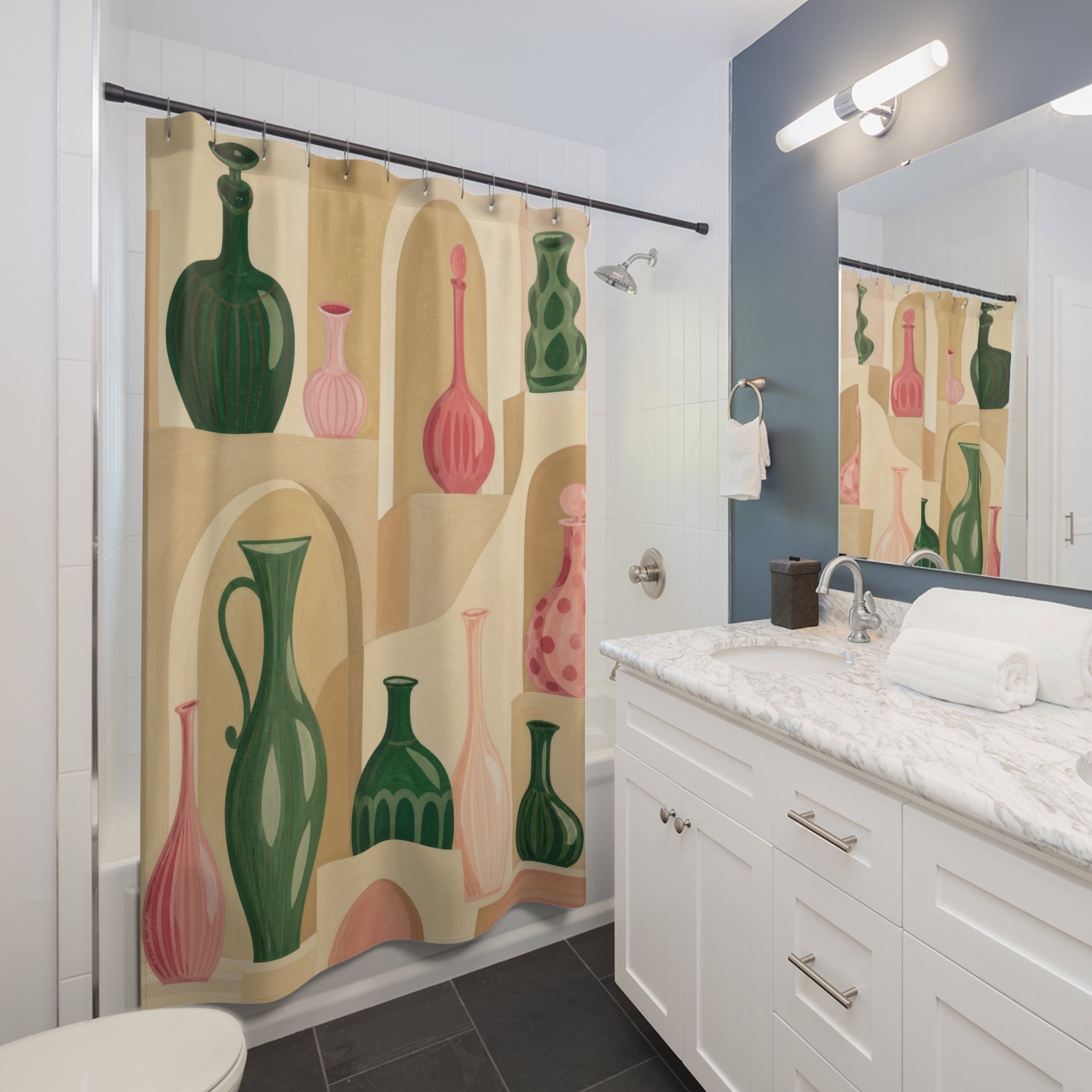 Green and pink glass vessels in stepped alcoves shower curtain beside a white vanity