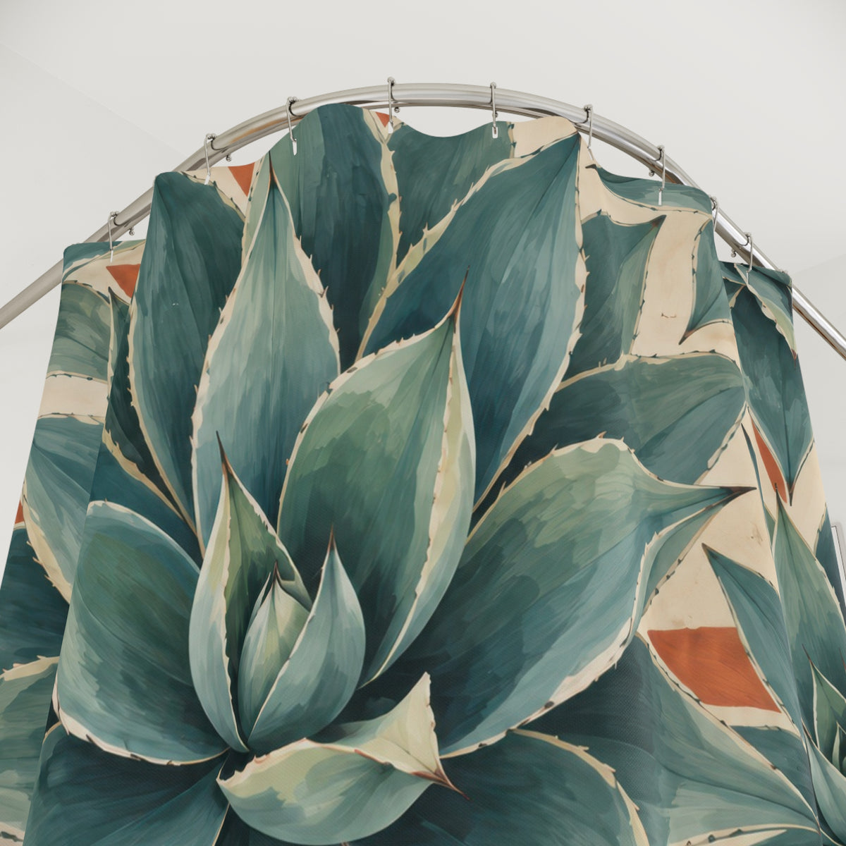 Blue green agave leaves in a geometric tile pattern shower curtain with close-up print, hooks, and folds