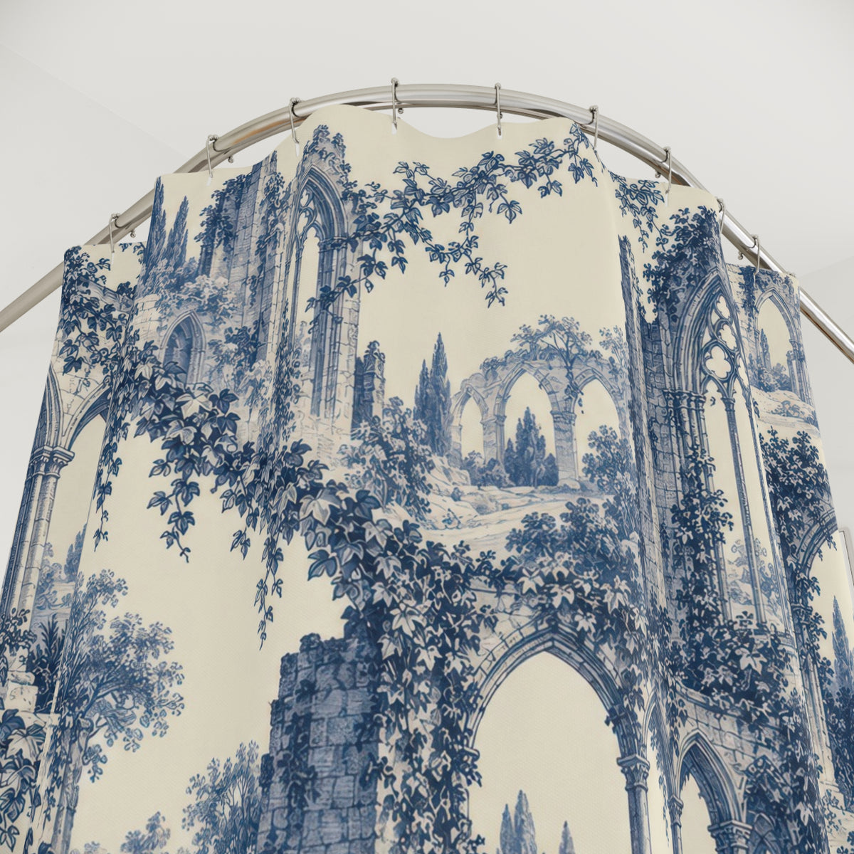 Blue Gothic abbey arches and trailing ivy on ivory shower curtain with close-up print, hooks, and folds