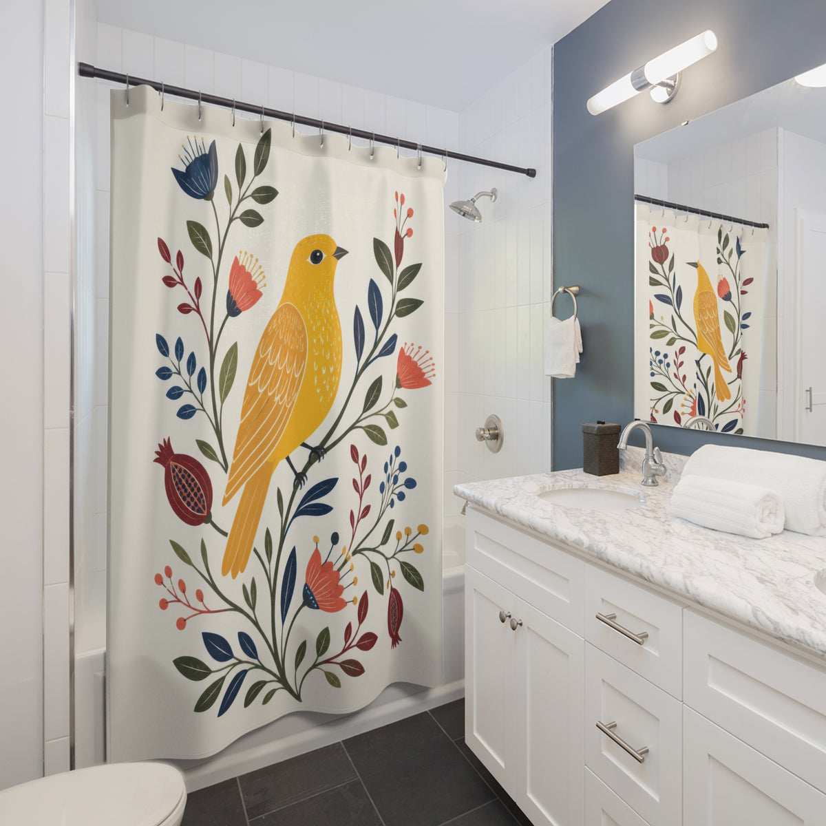 Golden yellow folk bird with colorful botanicals shower curtain beside a white vanity