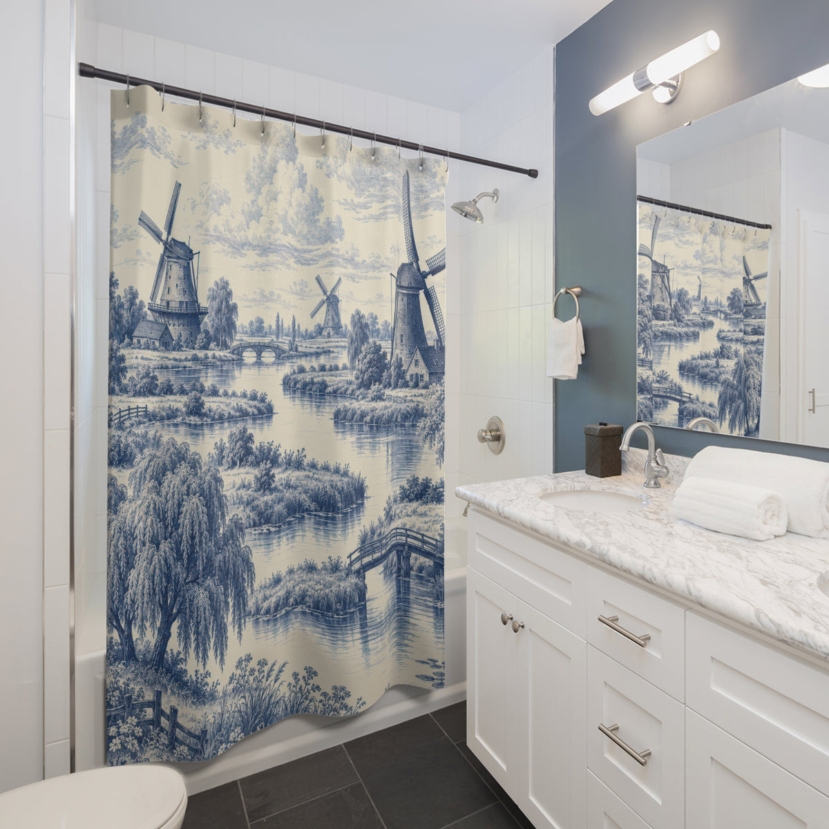 Blue windmills and willow trees beside an ivory canal shower curtain beside a white vanity