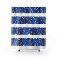 Cobalt monstera leaf bands alternating with white stripes shower curtain with full front view