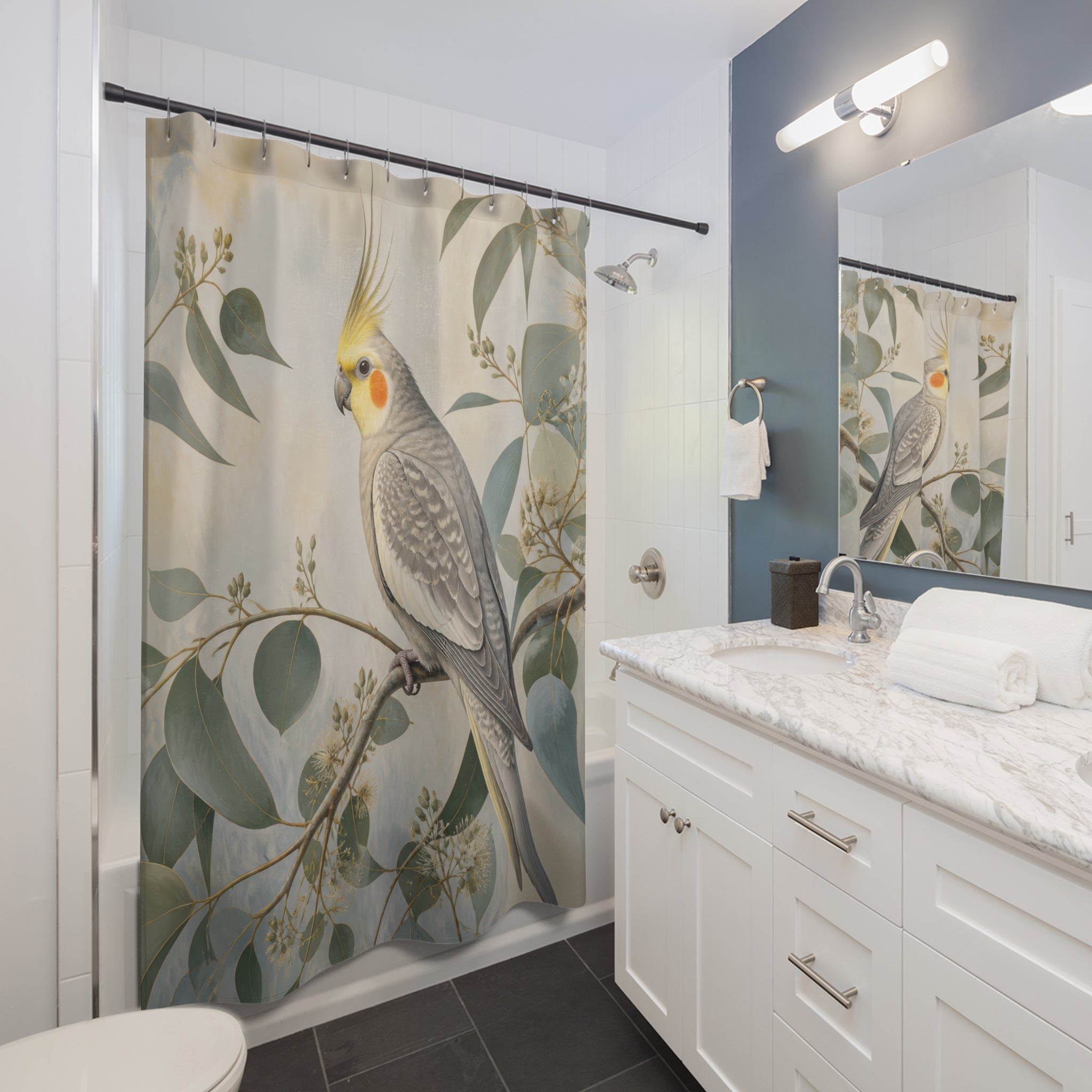 Grey cockatiel among sunlit eucalyptus leaves shower curtain installed beside a white vanity