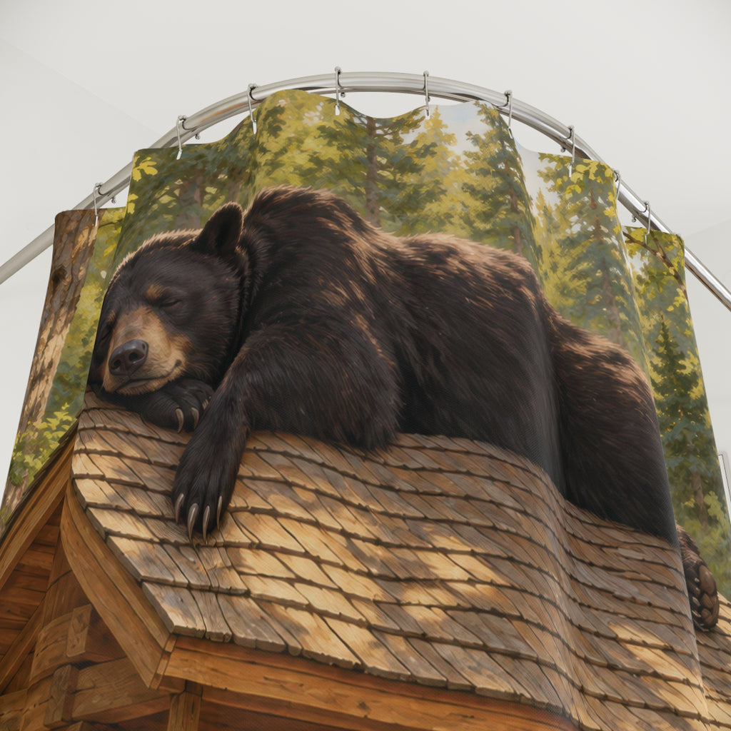 Sleepy black bear on a log cabin roof shower curtain with close-up print, hooks, and folds
