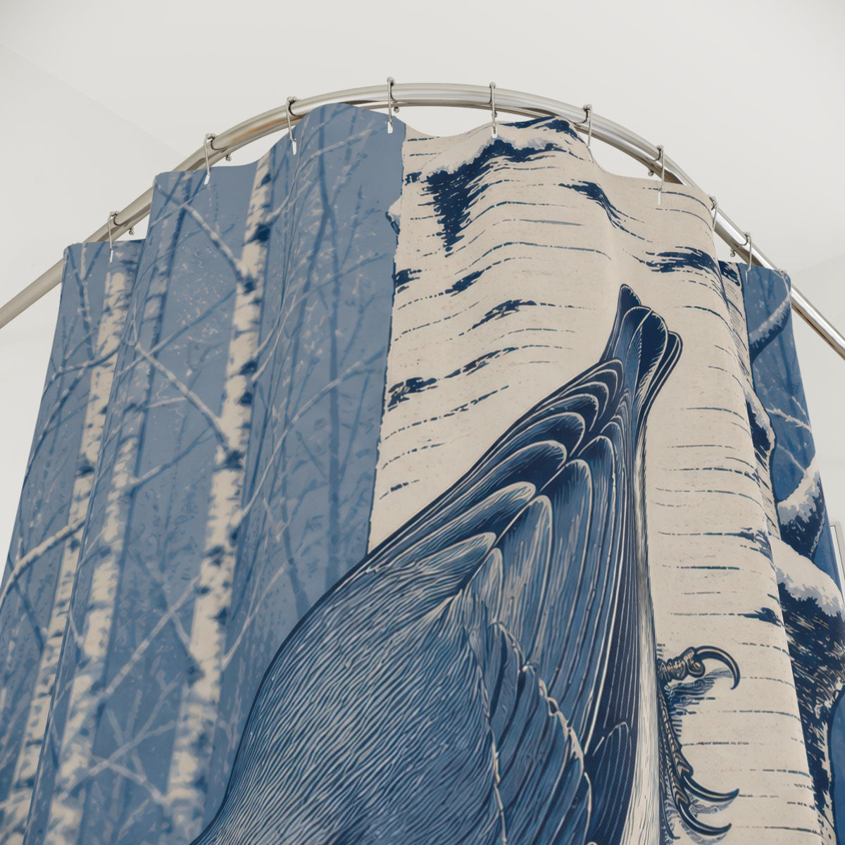 Blue nuthatch on snowy birch shower curtain with close-up print, hooks, and folds
