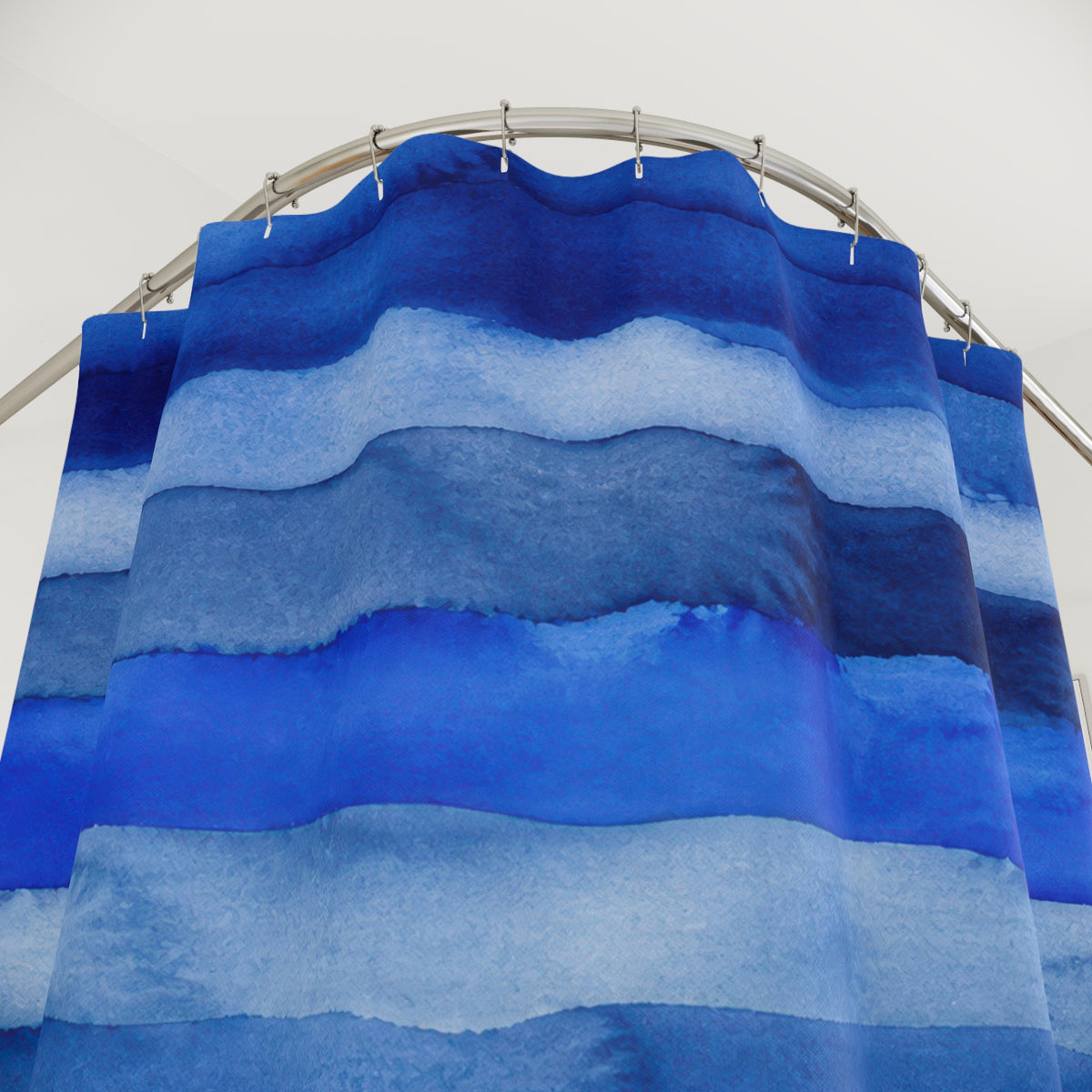 Cobalt Navy Horizontal Stripe watercolor shower curtain with close-up print, hooks, and folds