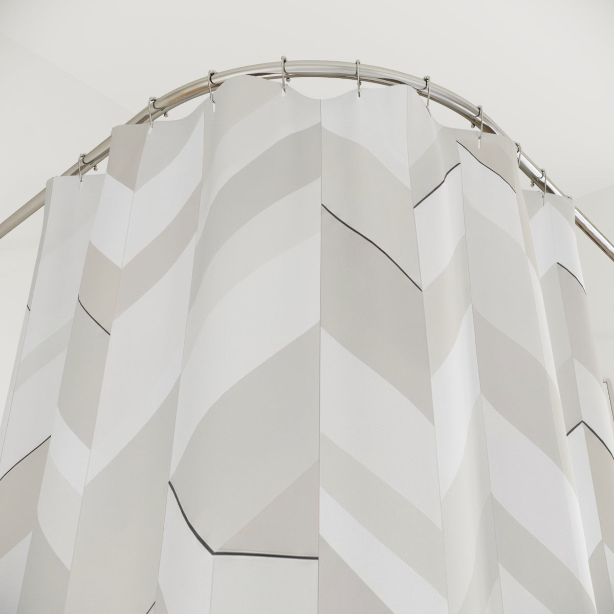 White and greige herringbone terraces with dark accents shower curtain with close-up print, hooks, and folds