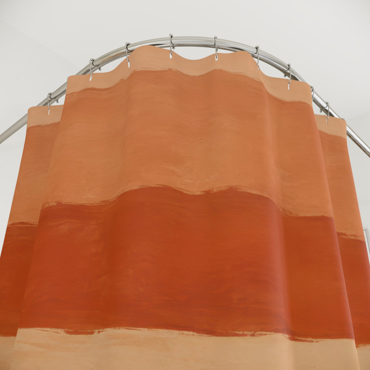 Painterly wide terracotta cream and umber horizontal stripes shower curtain with close-up print, hooks, and folds