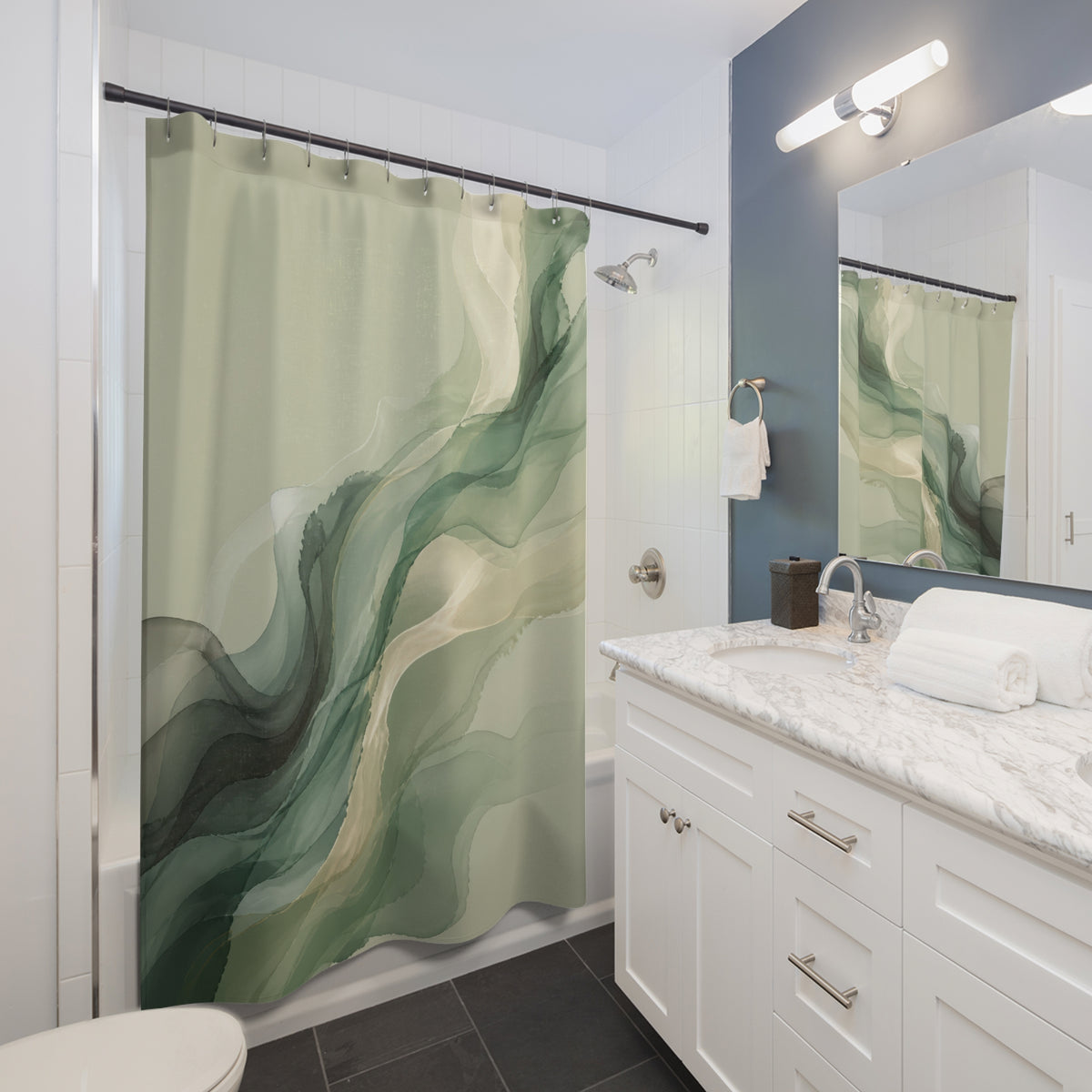 Abstract sage and olive ink wash forms with charcoal accents shower curtain beside a white vanity