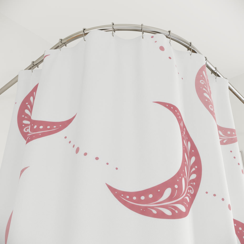 Pink crescent moons with white sprigs and dotted trails shower curtain with close-up print, hooks, and folds