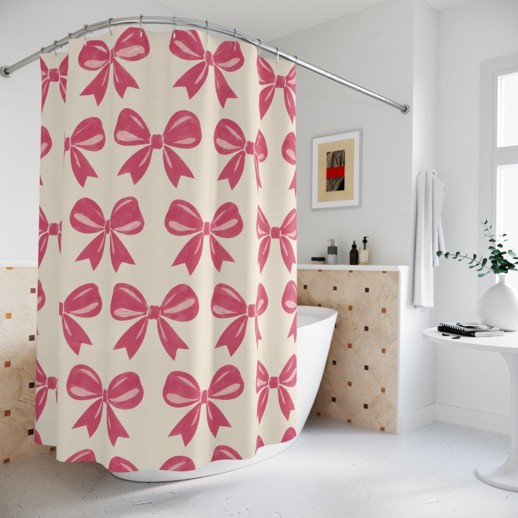 Pink bow pattern with raspberry loops on warm cream shower curtain beside a freestanding tub