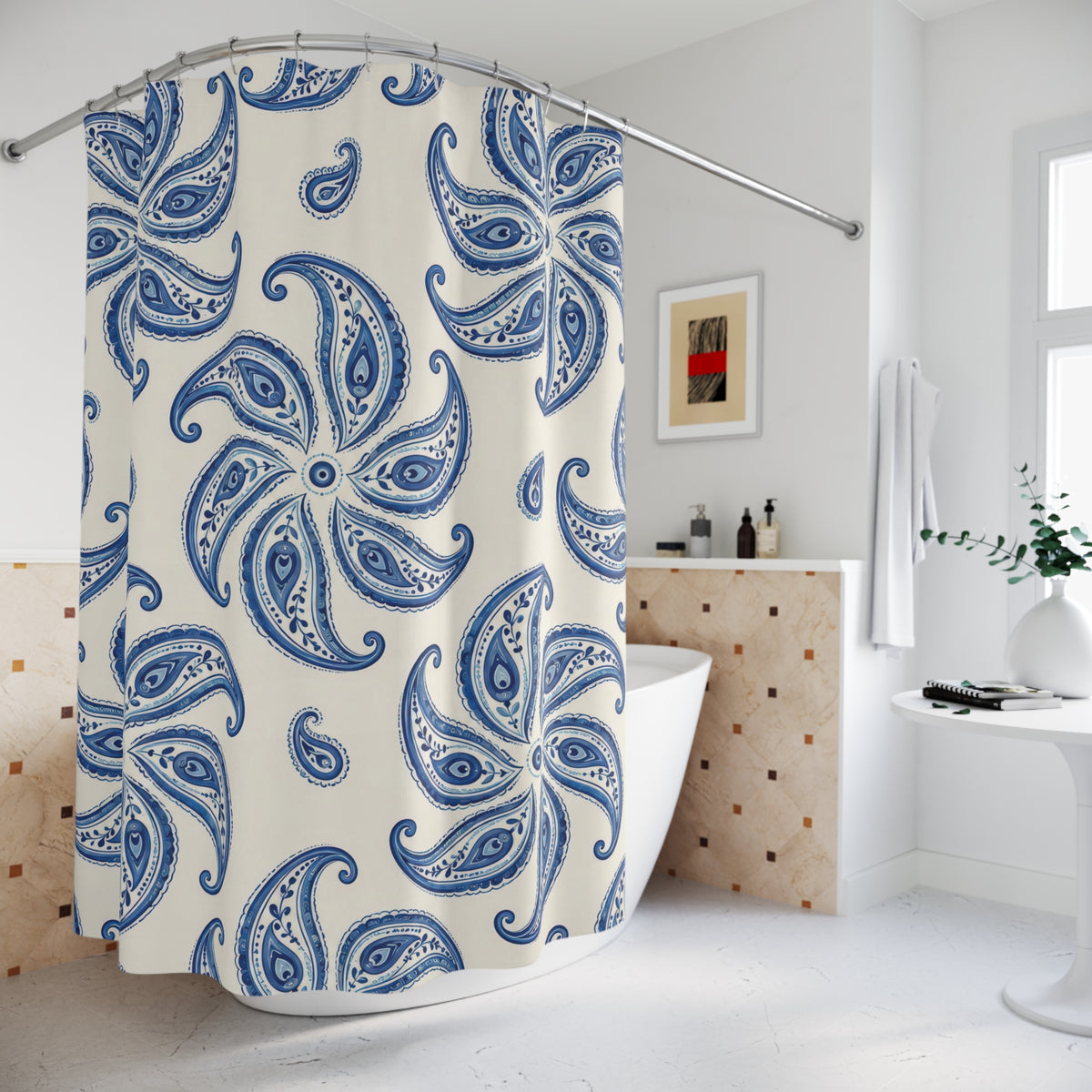 Cobalt blue paisley pinwheel medallions on ivory shower curtain beside a freestanding tub