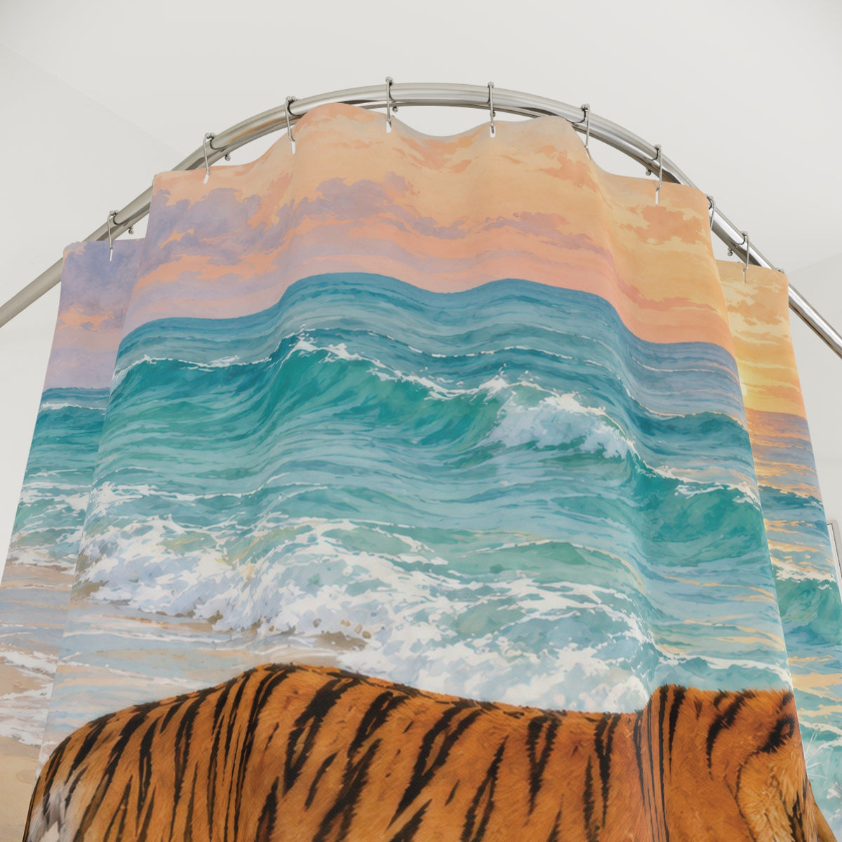 Orange tiger on golden sand beside turquoise surf shower curtain with close-up print, hooks, and folds