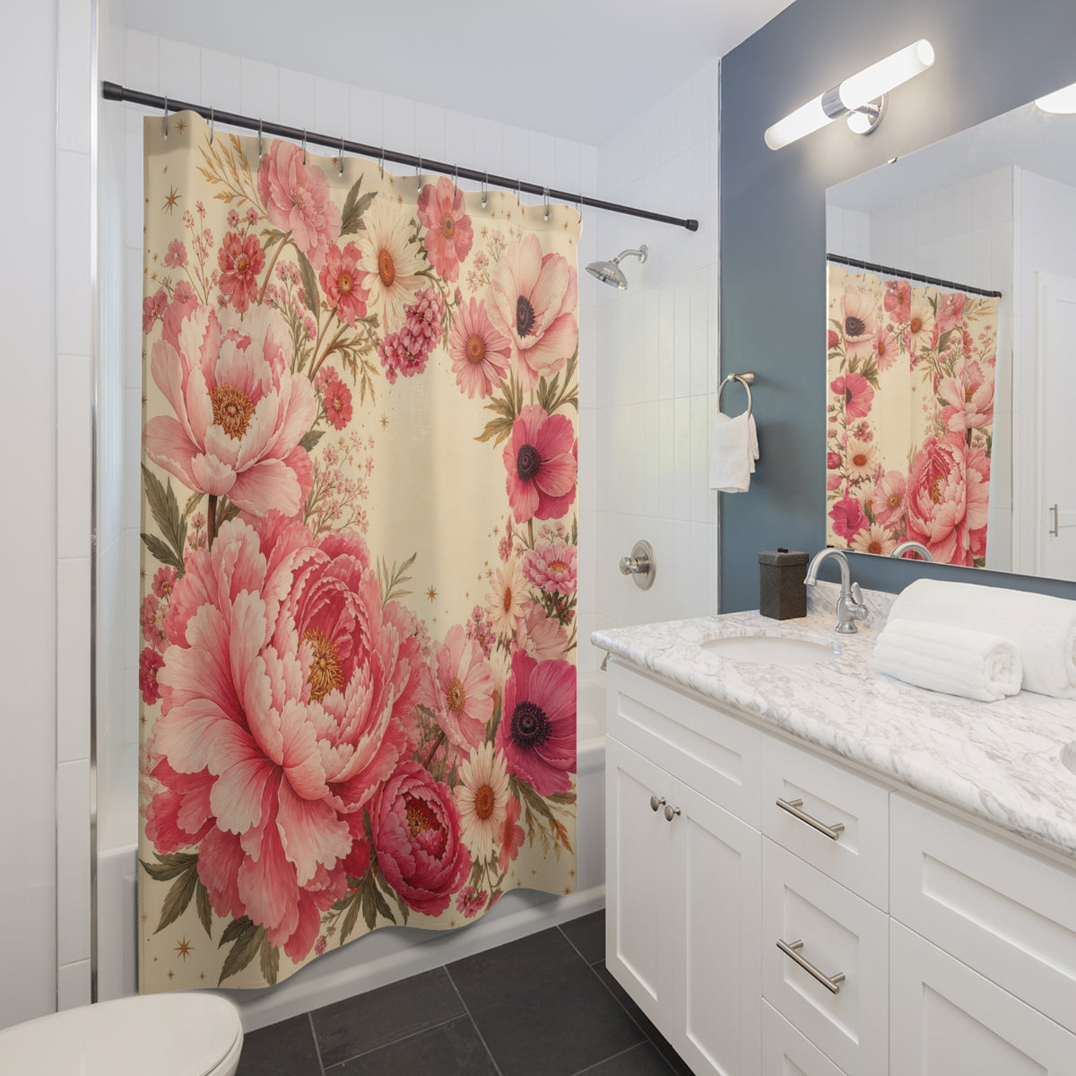 Pink peonies in a celestial floral orbit shower curtain beside a white vanity