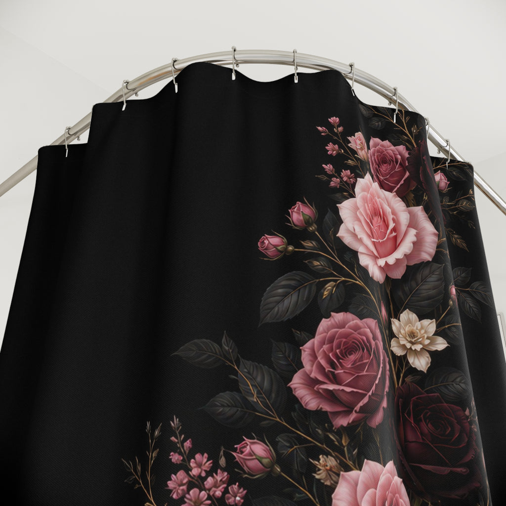 Close-up of Pink and burgundy roses rising in a serpentine curve on black shower curtain with hooks and folds