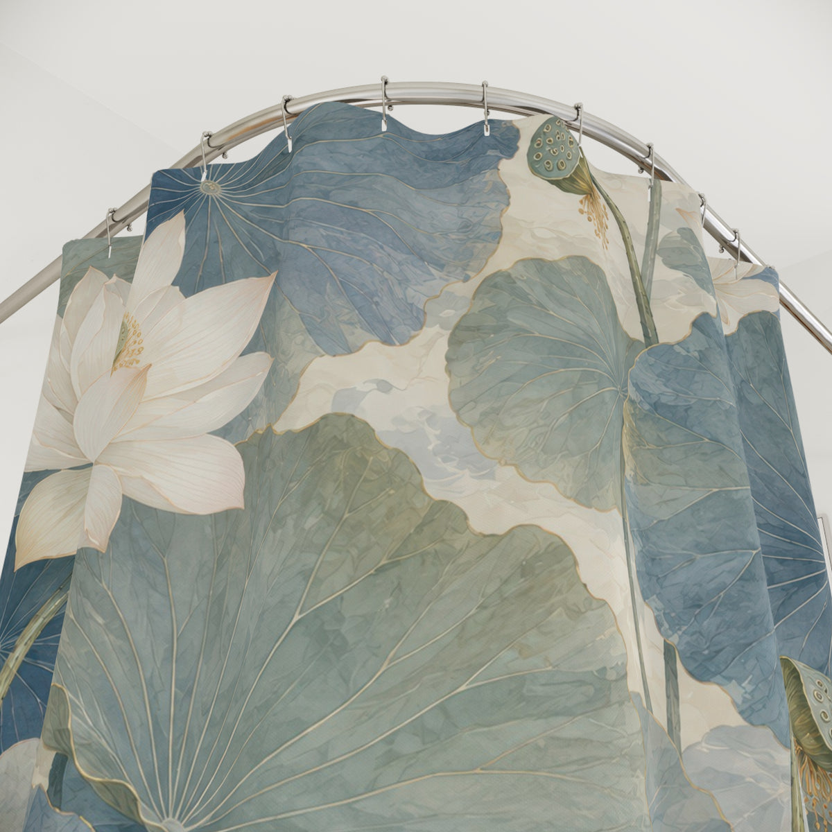 White lotus with blue and sage Chinoiserie leaves shower curtain with close-up print, hooks, and folds
