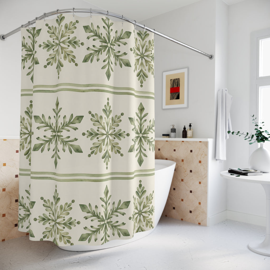 Sage leafy snowflakes in cream bands with green stripes shower curtain beside a freestanding tub