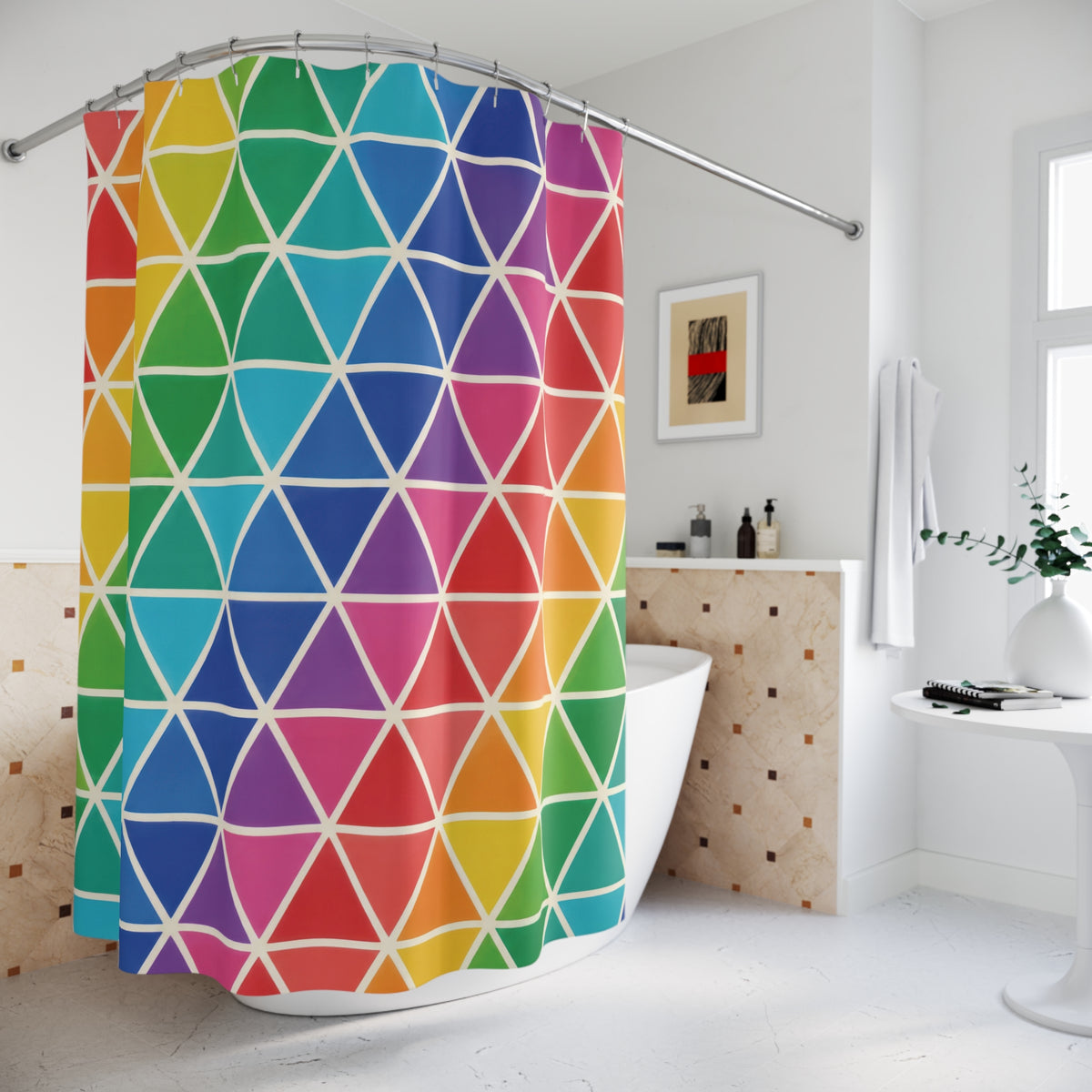 Rainbow triangles separated by slim ivory lines shower curtain beside a freestanding tub