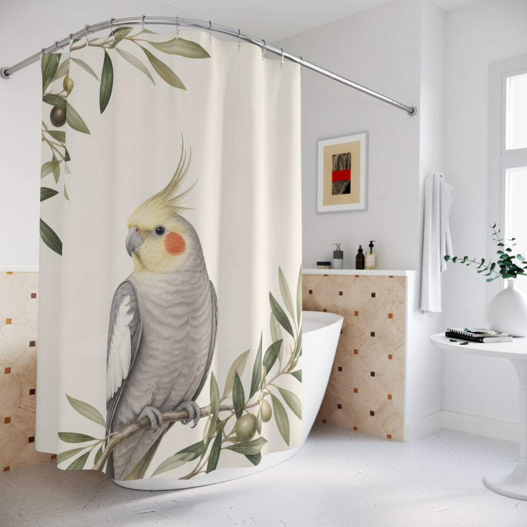Grey cockatiel framed by airy olive branches on warm ivory shower curtain styled beside a freestanding tub
