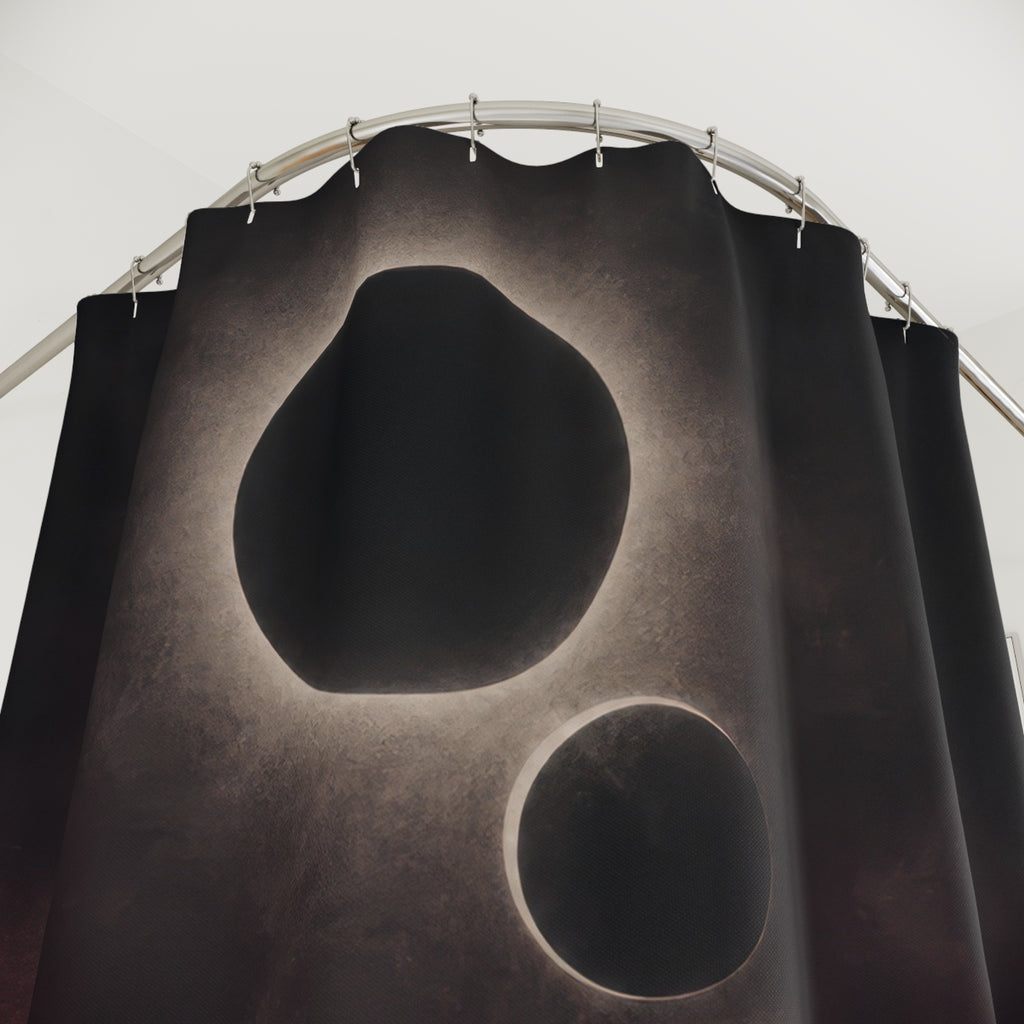 Charcoal eclipse with a silver halo and descending orbital forms shower curtain with close-up print, hooks, and folds