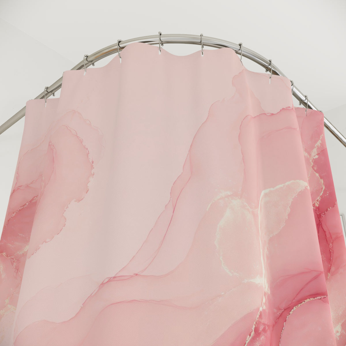 Flowing blush pink ink with rose and ivory swirls shower curtain with close-up print, hooks, and folds