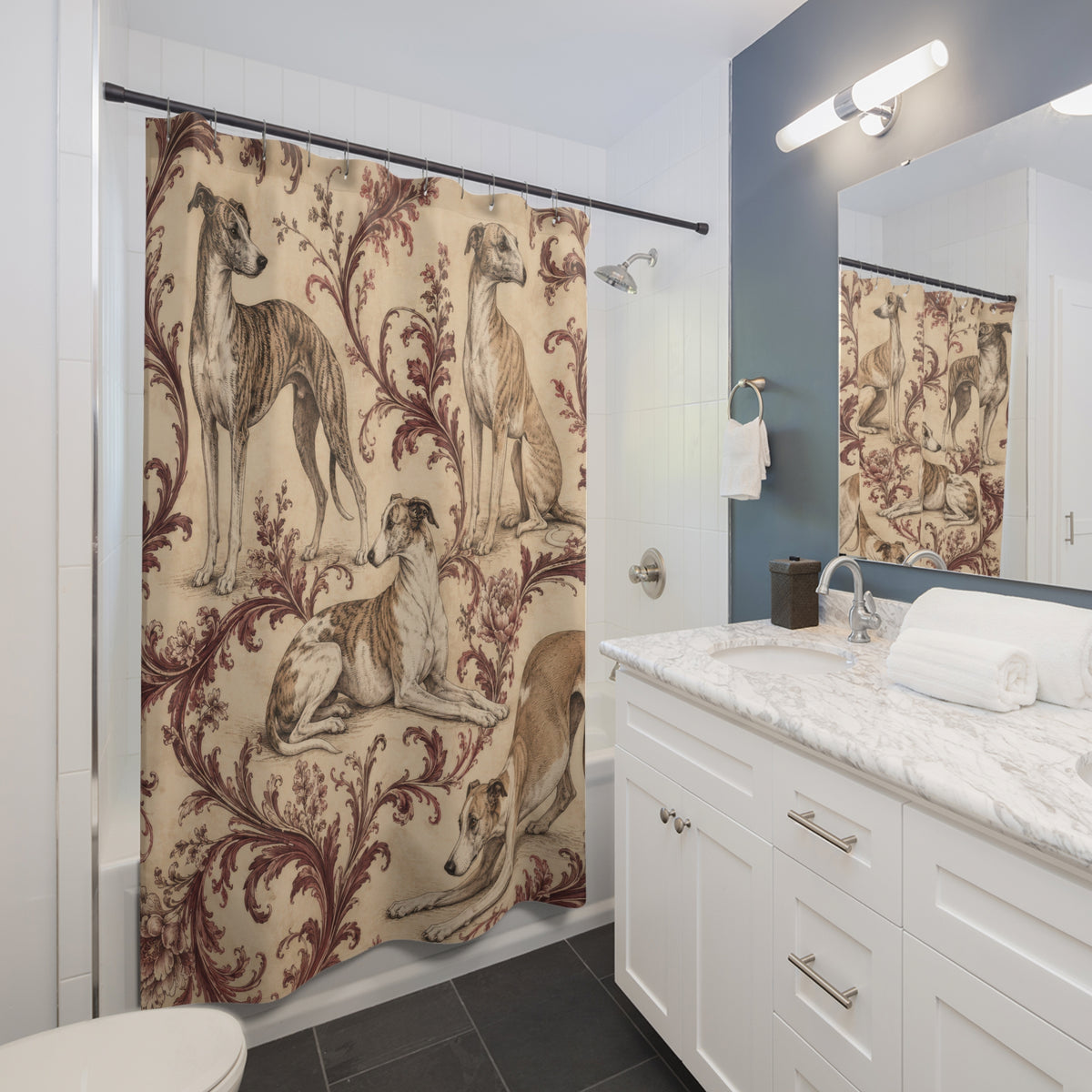 Whippets among burgundy ornamental foliage shower curtain beside a white vanity