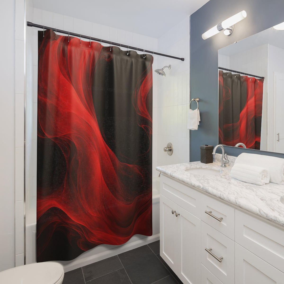 Flowing scarlet currents curling around black pools shower curtain beside a white vanity