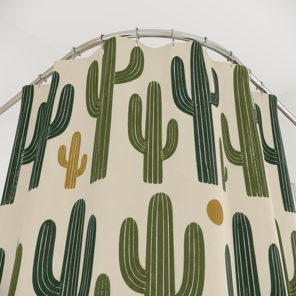 Green saguaro cactus pattern on cream shower curtain with close-up print, hooks, and folds