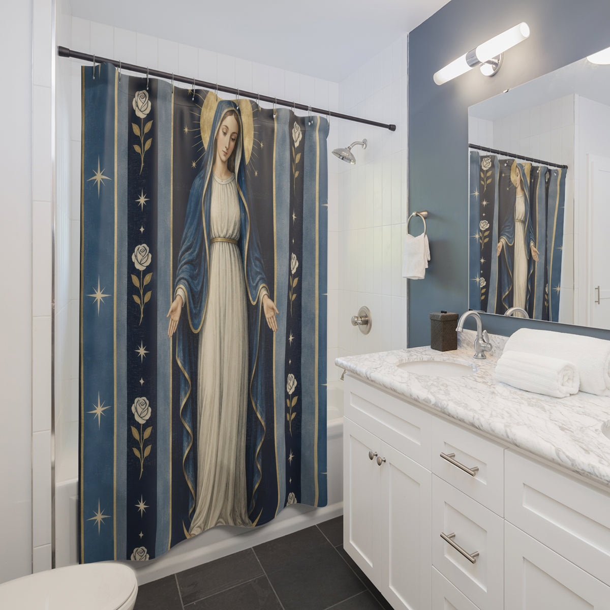 Virgin Mary with indigo stripes and ivory roses shower curtain beside a white vanity