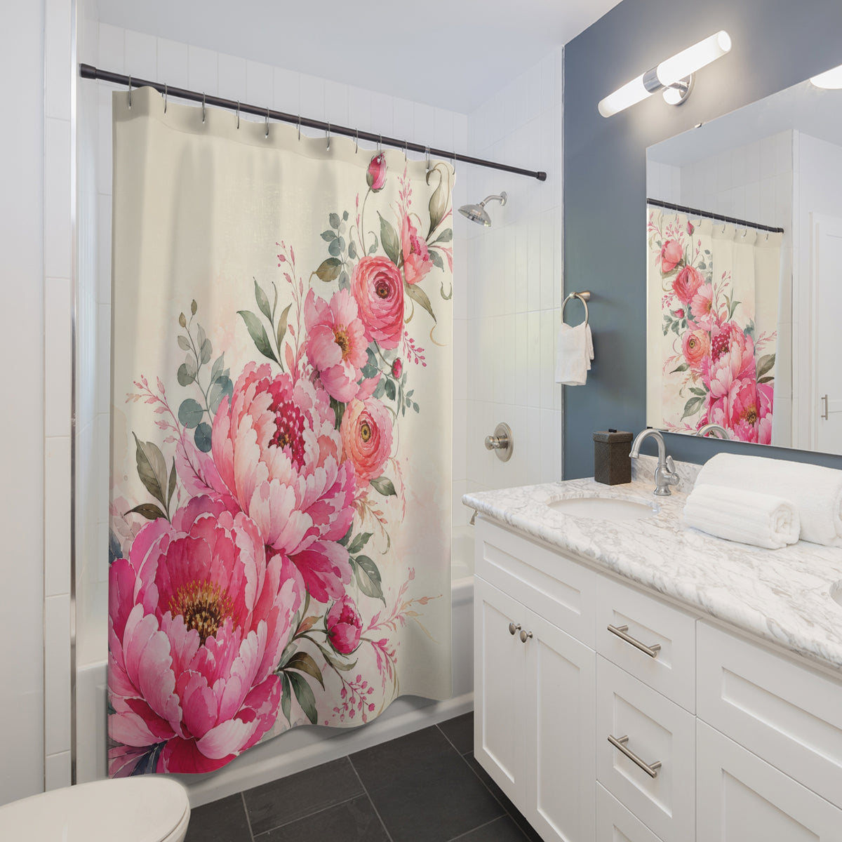 Pink watercolor wildflowers and meadow stems shower curtain beside a white vanity