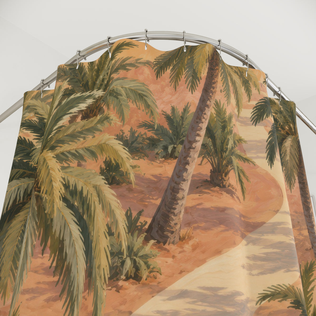 Olive palm trees beside a cream path on apricot ground shower curtain with close-up print, hooks, and folds