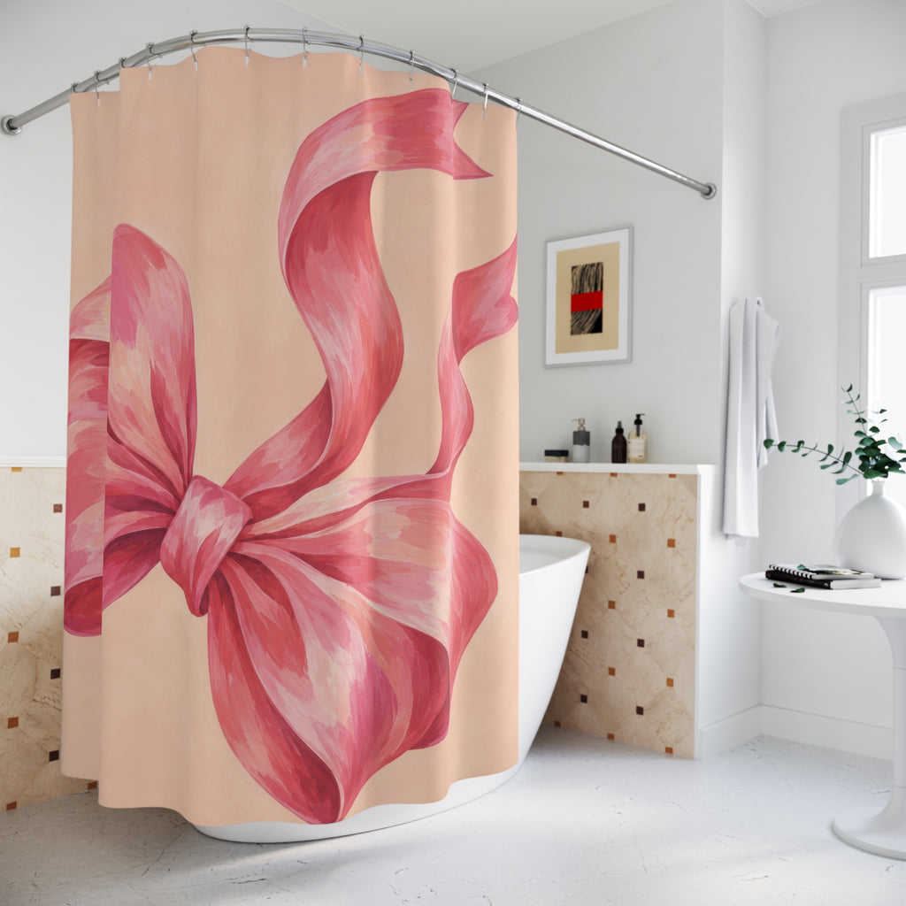 Oversized pink bow with curling tails on pale peach shower curtain beside a freestanding tub