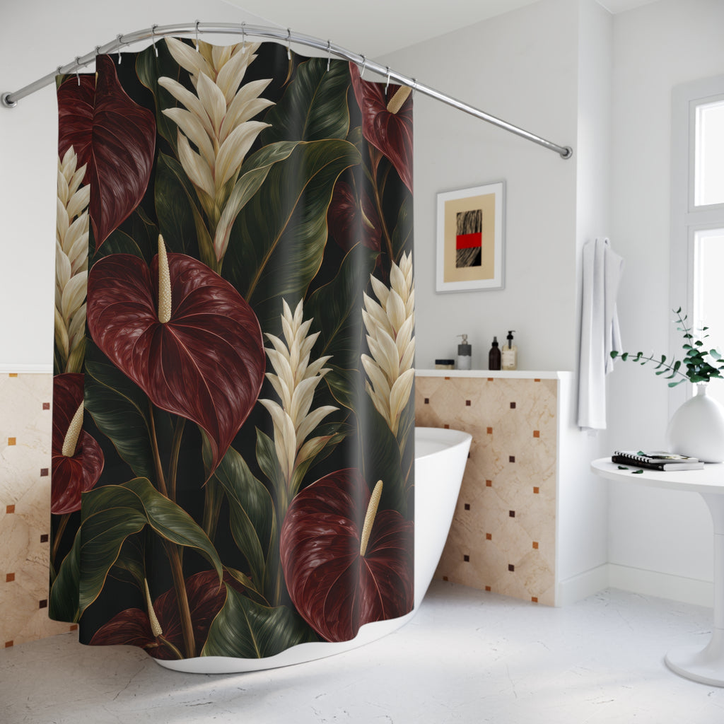 Burgundy anthuriums and cream flowers on black shower curtain beside a freestanding tub