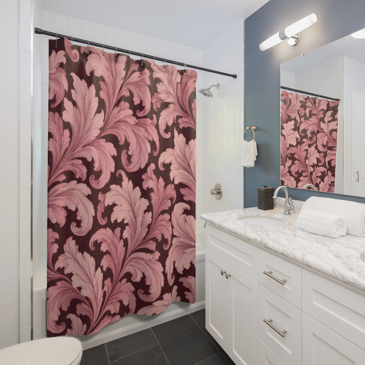 Blush acanthus leaves on deep burgundy shower curtain beside a white vanity